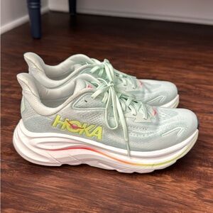 Hoka Mint and Neon Yellow Athletic Shoes